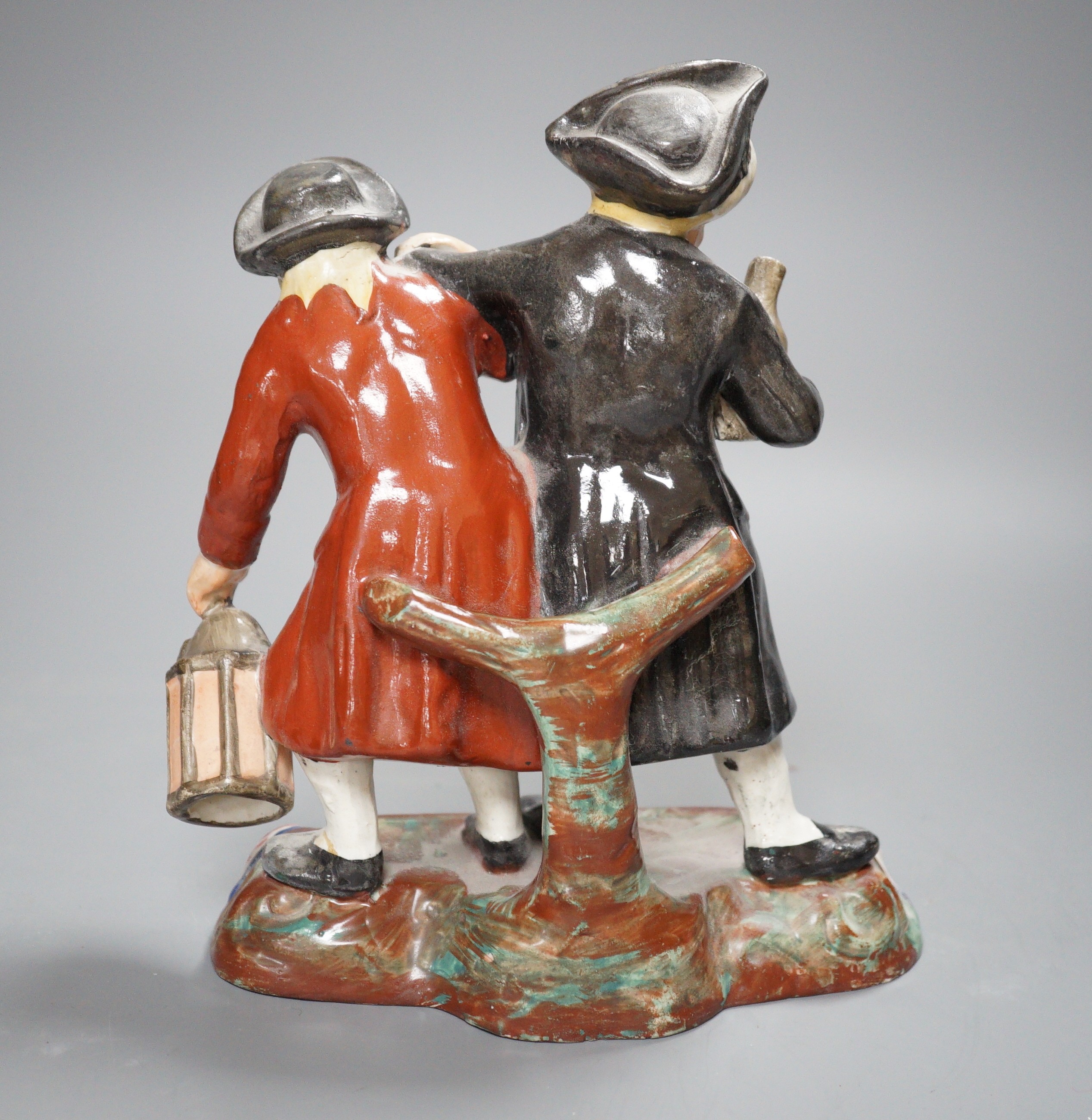 A Staffordshire pottery group of topers, 22cm